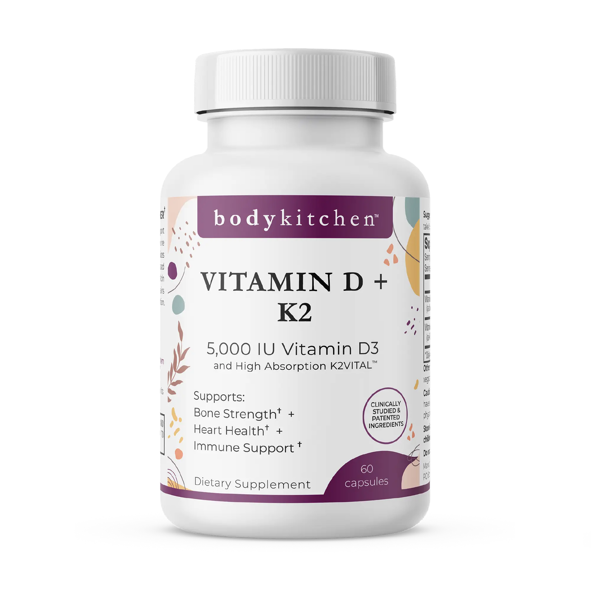 A bottle of Body Kitchen Vitamin D + K2 supplement with 60 capsules, featuring 5000 IU of Vitamin D3 and 180 mcg of K2. The label highlights bone strength, heart health, and immune support.