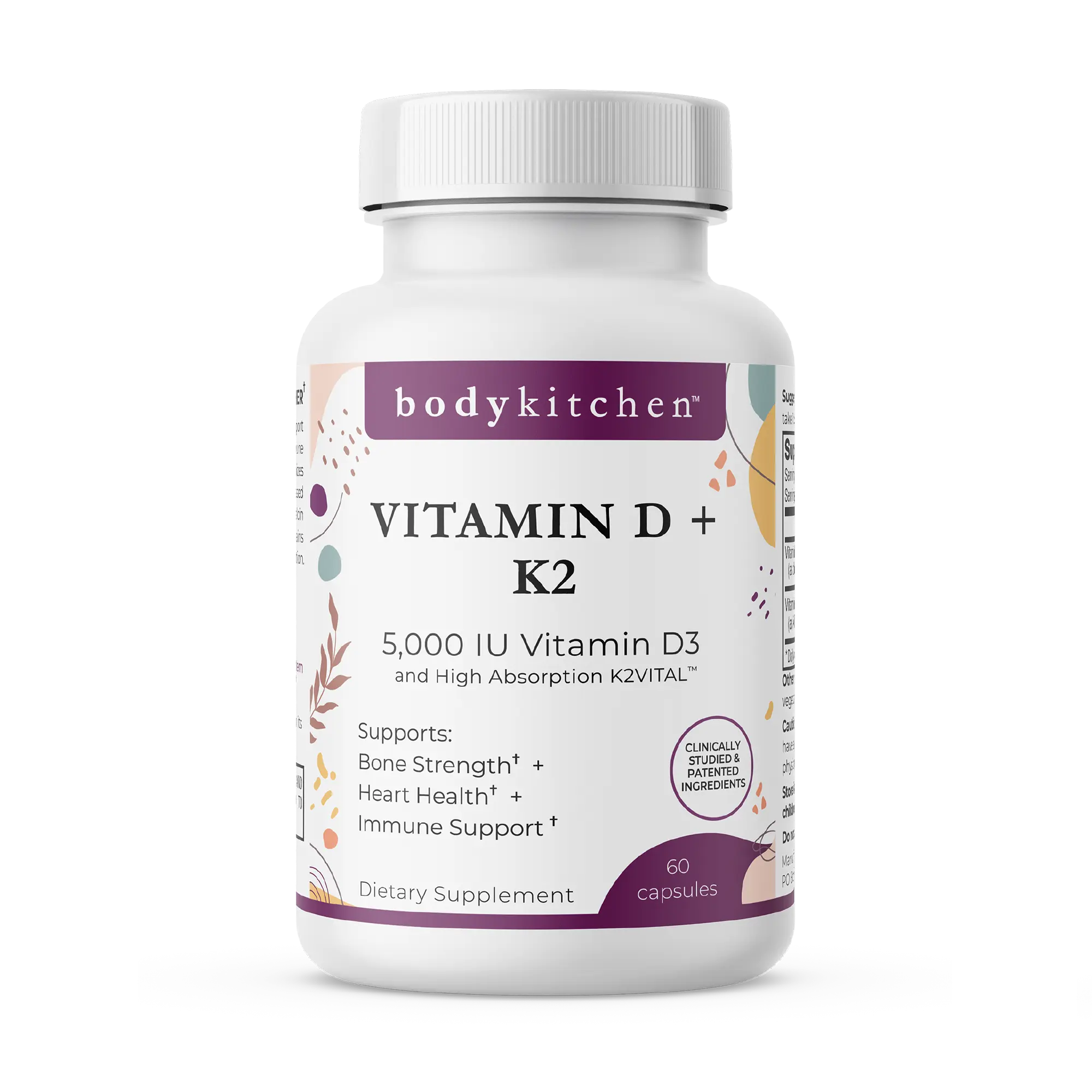 A bottle of Body Kitchen Vitamin D + K2 supplement with 60 capsules, featuring 5000 IU of Vitamin D3 and 180 mcg of K2. The label highlights bone strength, heart health, and immune support.